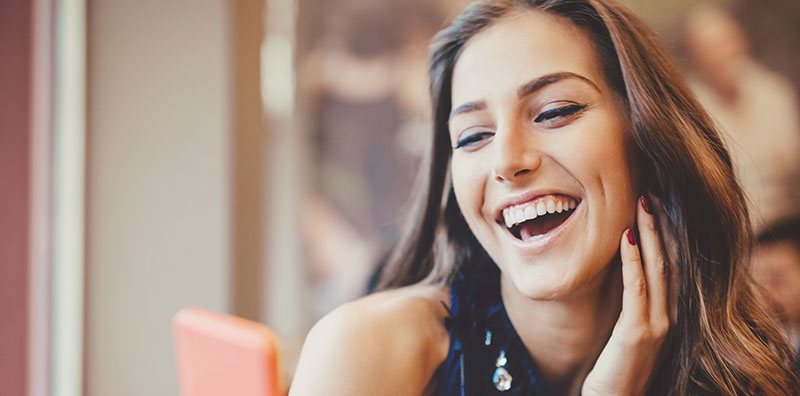 9 Health Benefits Of Smiling | NewSmile™